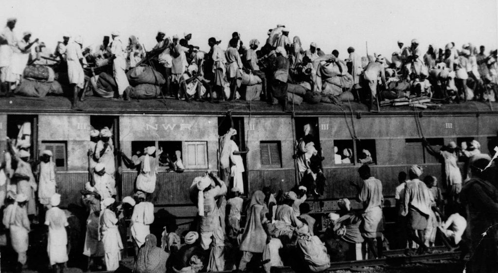 Muslim refugees crowd atop a train leaving New Delhi for Pakistan in September 1947.